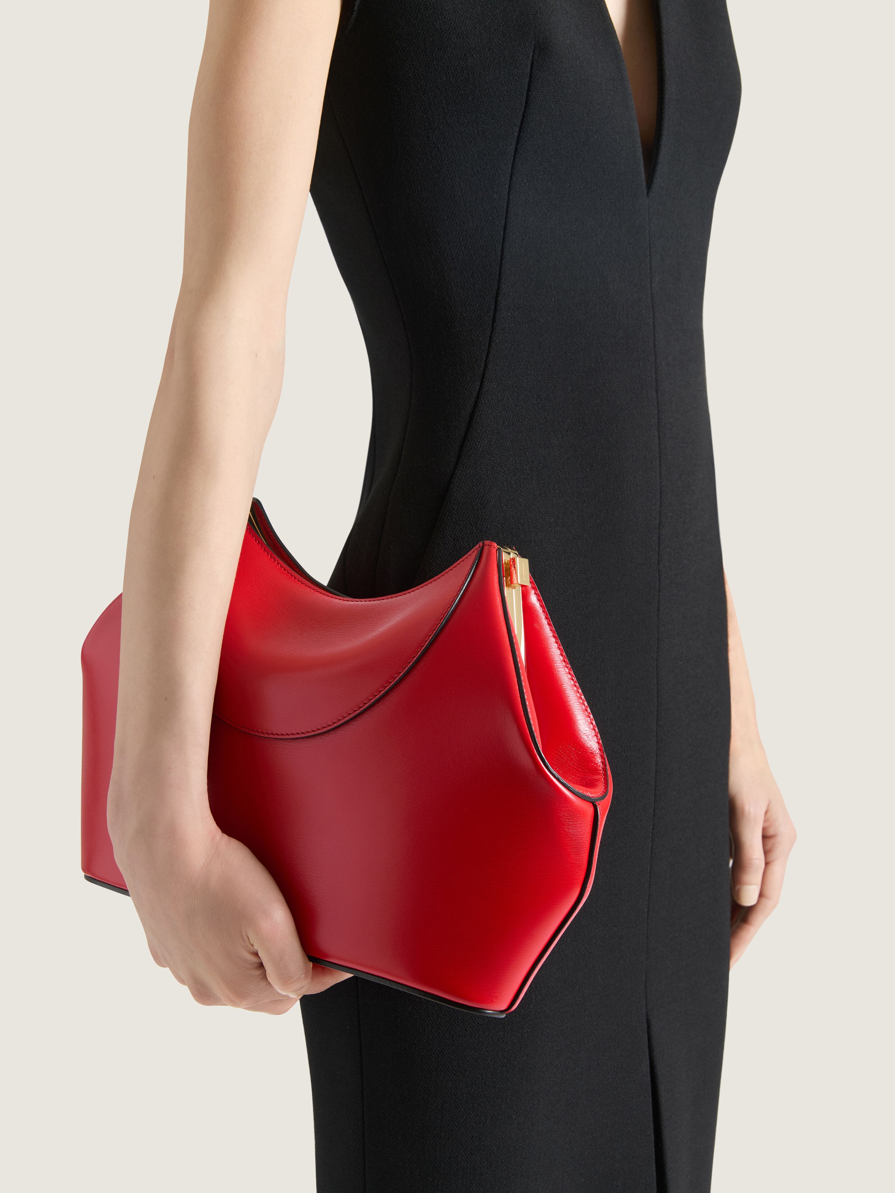 Facet clutch in leather